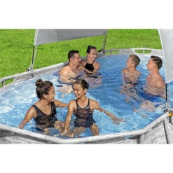 Auvent Pour Piscine Tubulaire Bestway Largeur 2,10 à 3,40 M -Magasin Piscines auvent ovale bestway ambiance 3