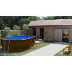 GRE Piscine Ovale Acier Gré Pacific Imitation Bois - 5 X 3 X 1,20 M -Magasin Piscines kit500w piscine ovale acier gre pacific imitation bois 500 300 120 ambiance 2